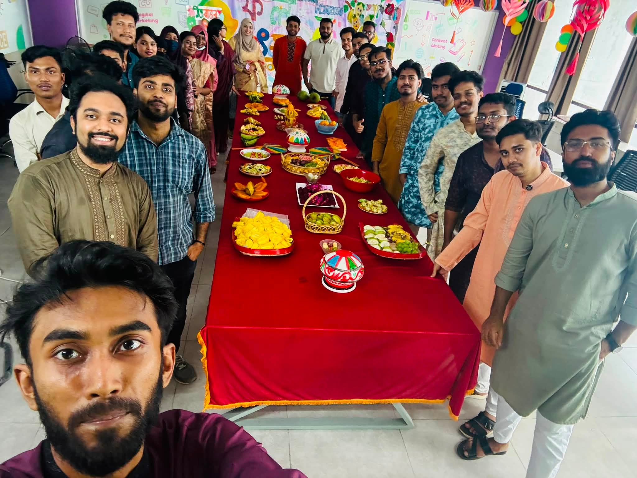 The team around a table laid for a celebration