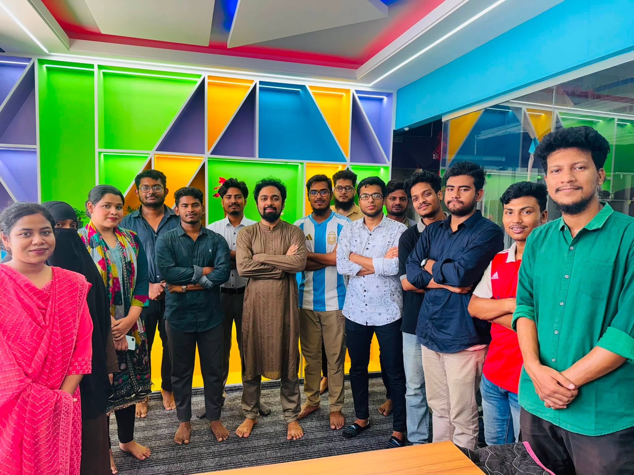 The team together in the studio
